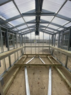 10x14 Greenhouse with Fan and Thermostat Interior Construction Gainesville FL, located in Gainesville, FL.