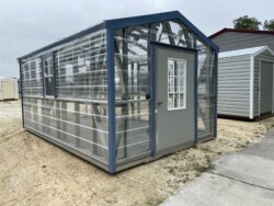 10x16 Greenhouse With Floor 12 Inch Fan with Thermostat 9 Lite Door and Electric Exterior View Gainesville FL, located in Gainesville, FL.